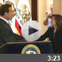 Governer Schwarzenegger shaking hands with Justice Cantil-Sakauye